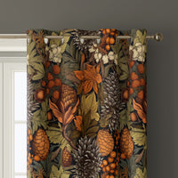 Close-up of autumn leaves floral curtain grommets on a black rod