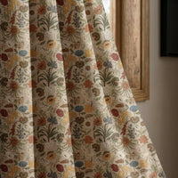 Autumn wildflower curtain panel beside a rustic wooden window