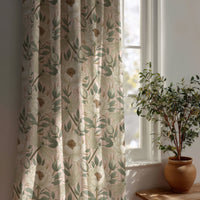 Beige leafy vine botanical curtain beside a potted olive tree