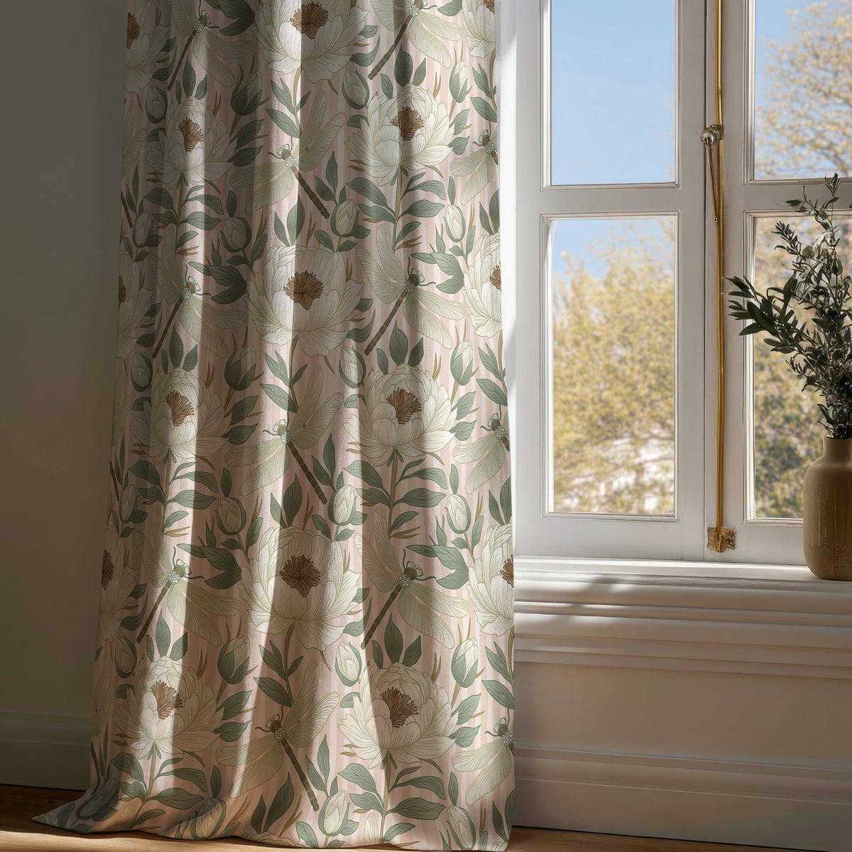 Full-length beige leafy vine botanical curtain draping to a wooden floor