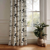 Black and white space rocket kids curtain panel hanging by a white window
