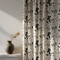 Soft daylight through a black and white space rocket kids curtain
