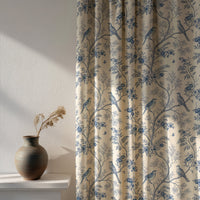 Soft daylight through a blue bird chinoiserie curtain