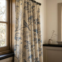 Blue bird toile curtains in a warm living room