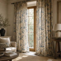 Blue bird toile curtains in a living room