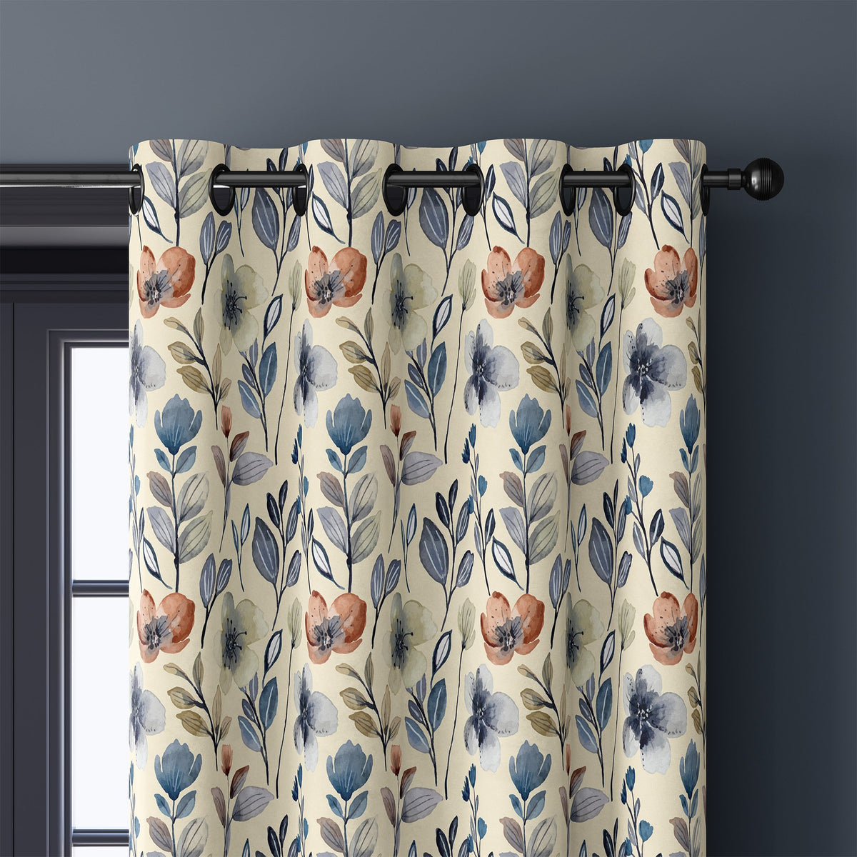 Close-up of blue folk wildflower curtain grommets on a black rod