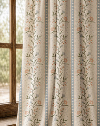 Pair of blue ticking stripe floral curtains at an arched window
