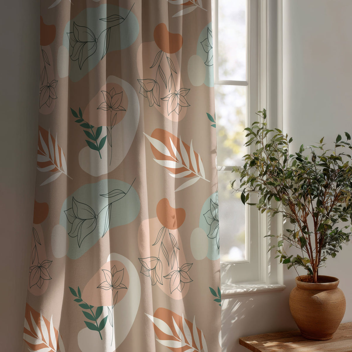 Blush abstract leaf boho curtain beside a potted olive tree