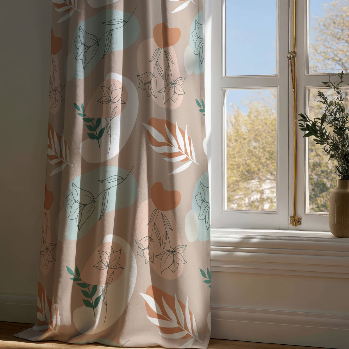 Full-length blush abstract leaf boho curtain draping to a wooden floor