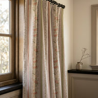 Blush floral trellis stripe curtains in a warm living room