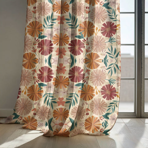 Bold pink and orange floral curtain panels by a sunny window