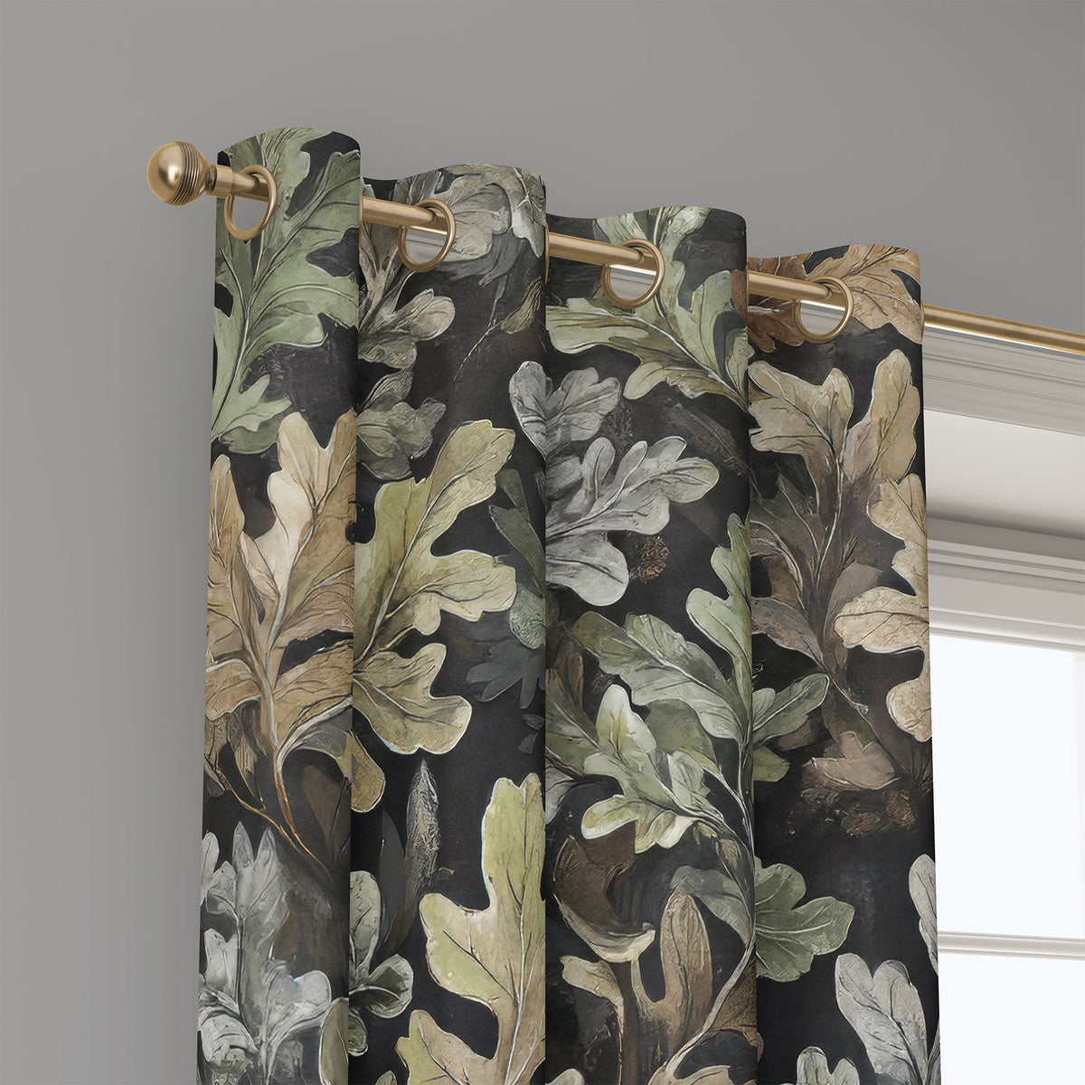 Grommet top of a charcoal oak leaf curtain on a brass rod