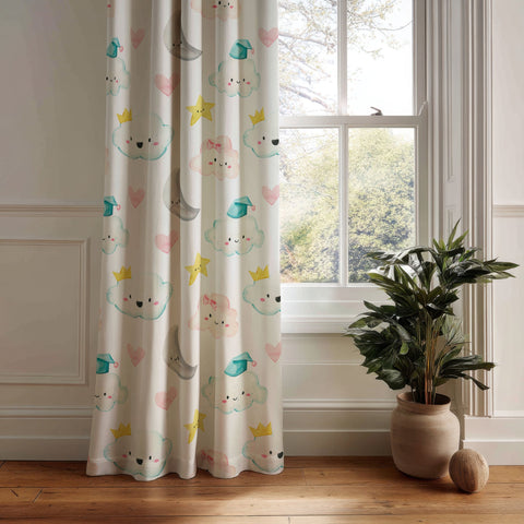 Cloud and moon nursery curtain panel hanging by a white window