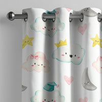 Cloud and moon nursery curtain on a grommet rod, close-up of the print