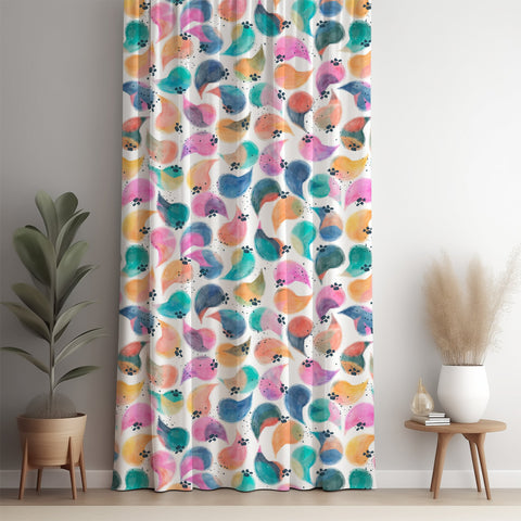 Colorful abstract bird curtain panel against a white wall
