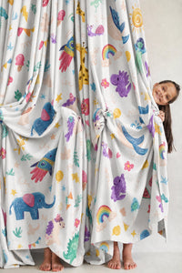 Colorful safari animal kids curtains in a child's bedroom