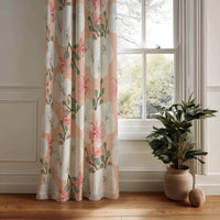 Coral hibiscus floral curtain panel hanging by a white window