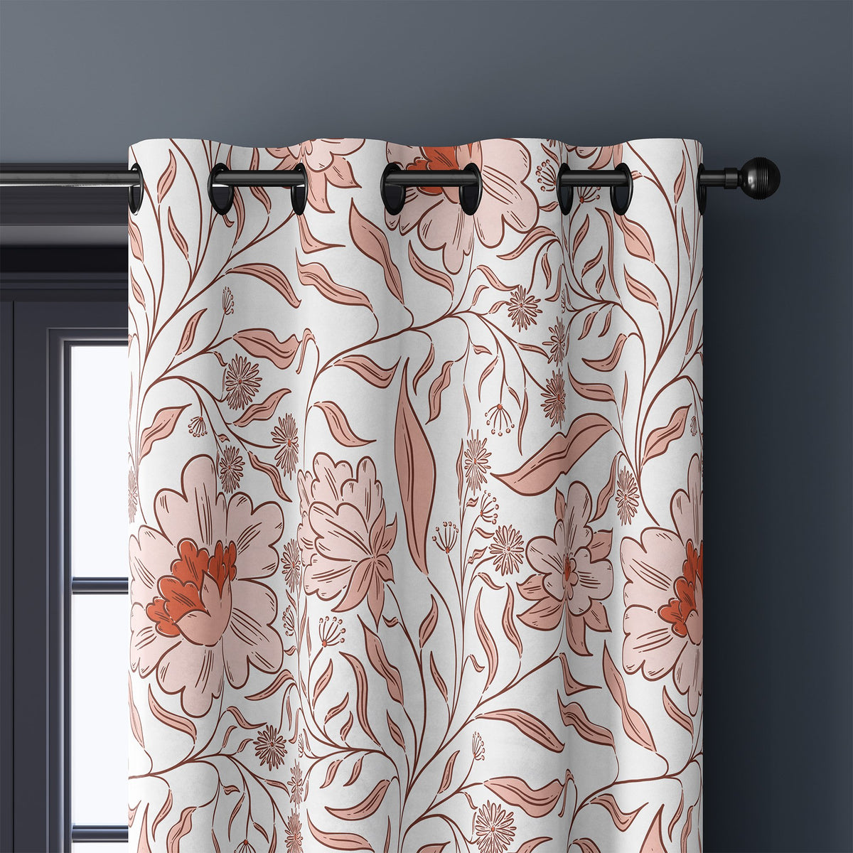 Close-up of coral line art blossom curtain grommets on a black rod