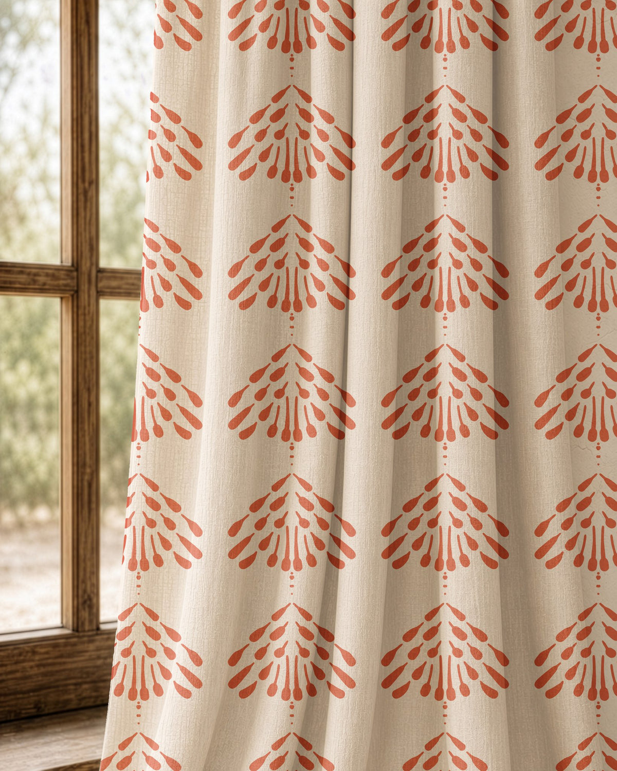 Pair of coral palmette block print curtains at an arched window