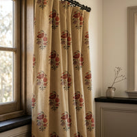 Flower vase block print curtains in a warm living room