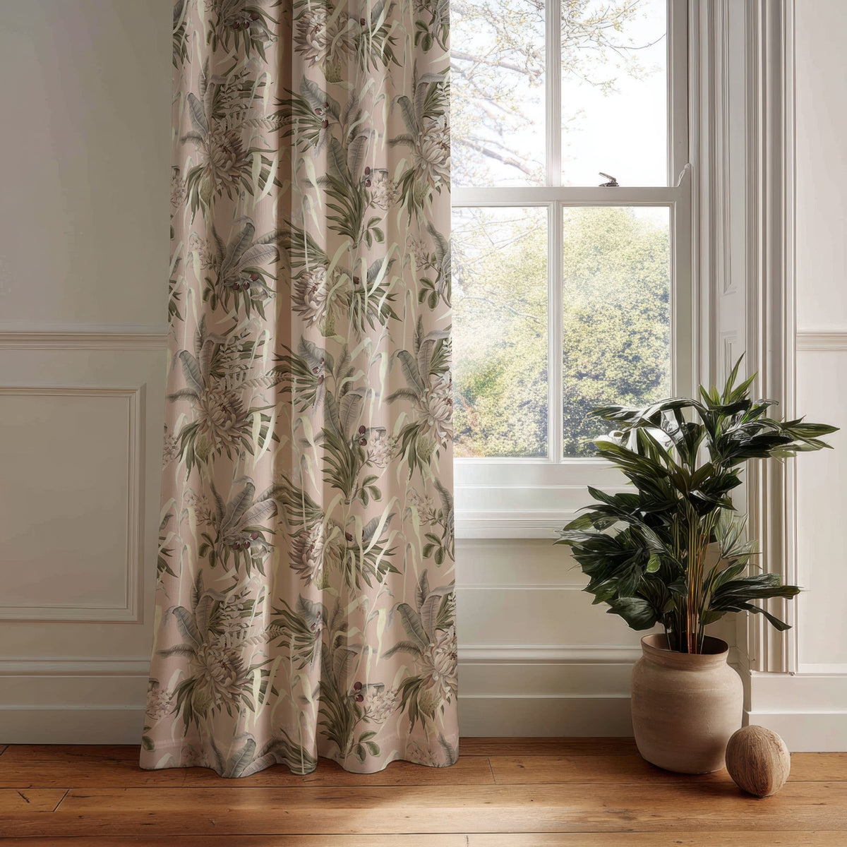 Green fern botanical curtain panel hanging by a white window