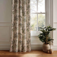 Green fern botanical curtain panel hanging by a white window