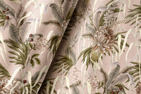 Pair of green fern botanical curtains in a living room