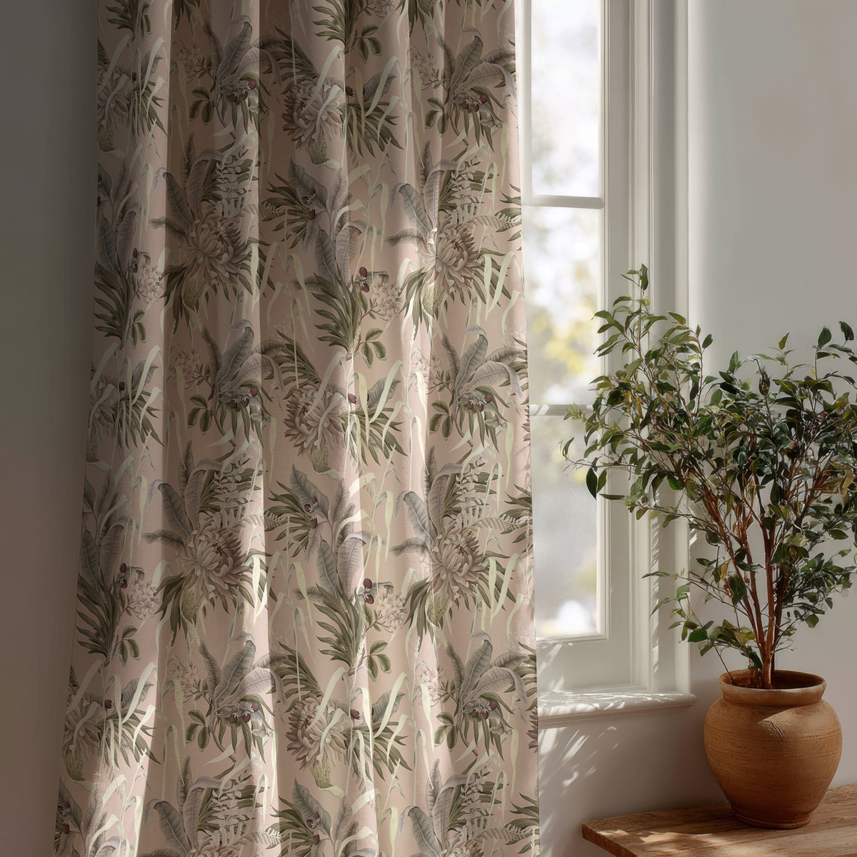 Green fern botanical curtain beside a potted olive tree