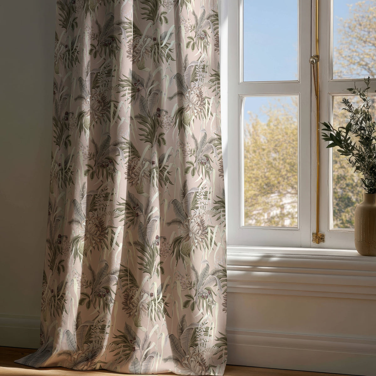 Full-length green fern botanical curtain draping to a wooden floor