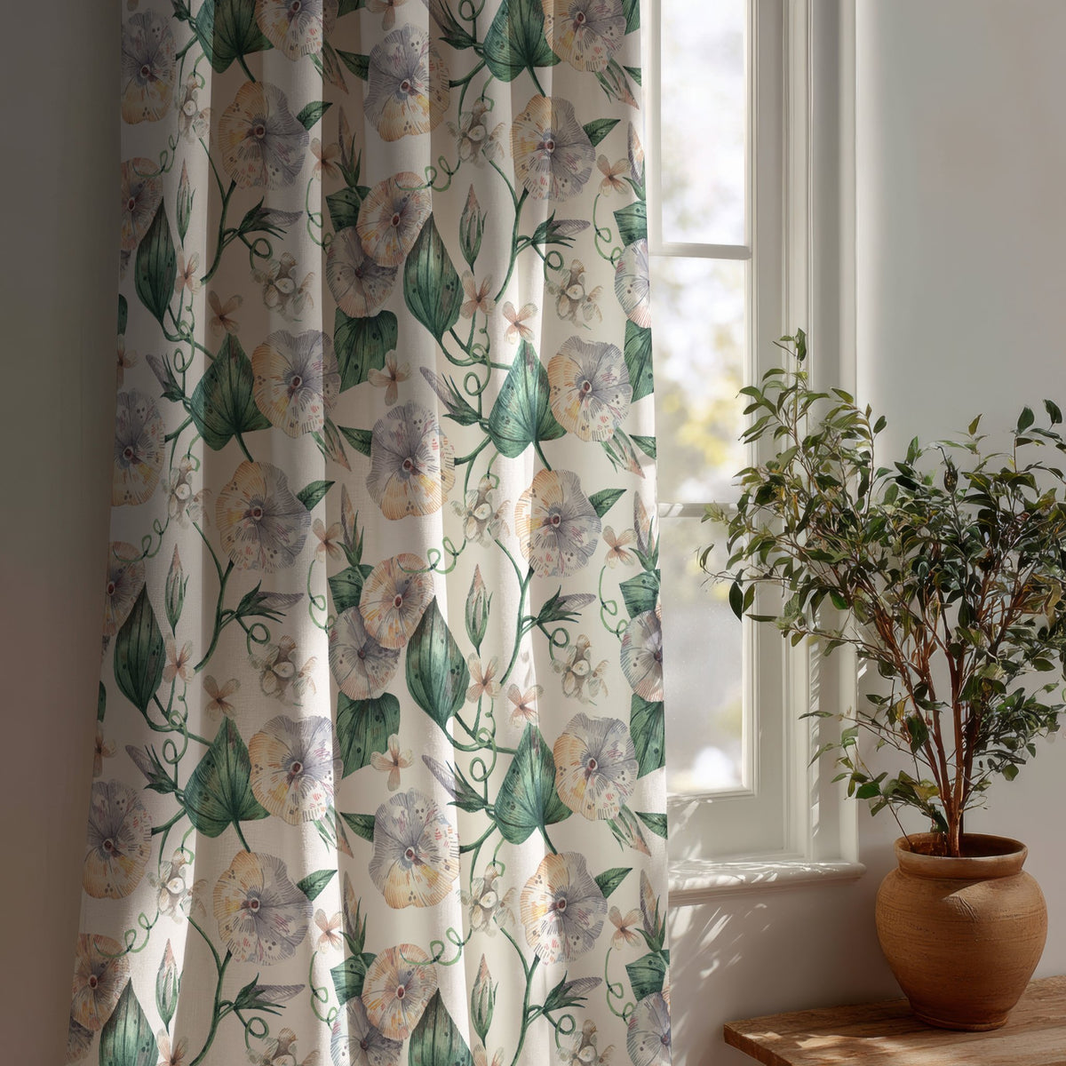 Green ivy botanical curtain beside a potted olive tree