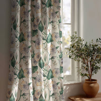 Green ivy botanical curtain beside a potted olive tree
