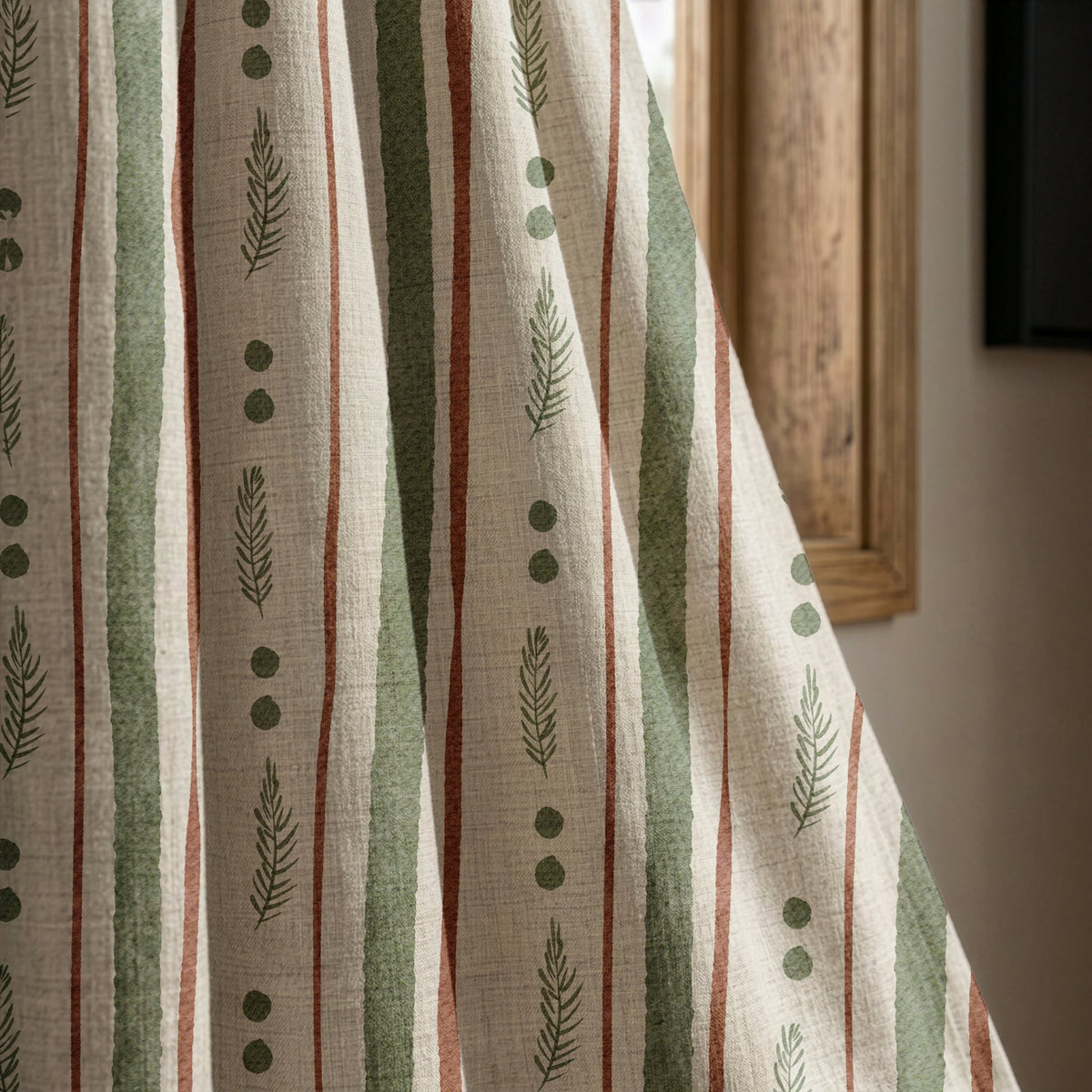 Green and rust painted stripe curtain panel beside a rustic wooden window