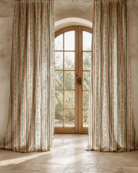 Two long green and rust painted stripe curtain panels