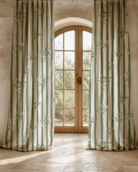 Two long green stripe botanical sprig curtain panels