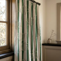 Green stripe dandelion curtains in a warm living room