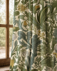 Pair of green thistle botanical curtains at an arched window