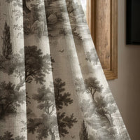 Grey landscape toile curtain panel beside a rustic wooden window