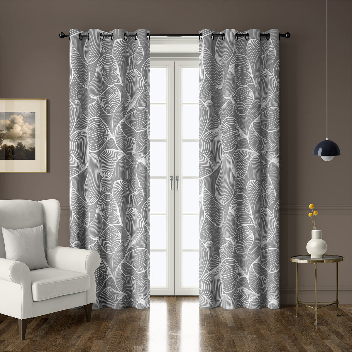Pair of grey line art leaf grommet curtains at French doors