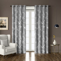 Pair of grey line art leaf grommet curtains at French doors