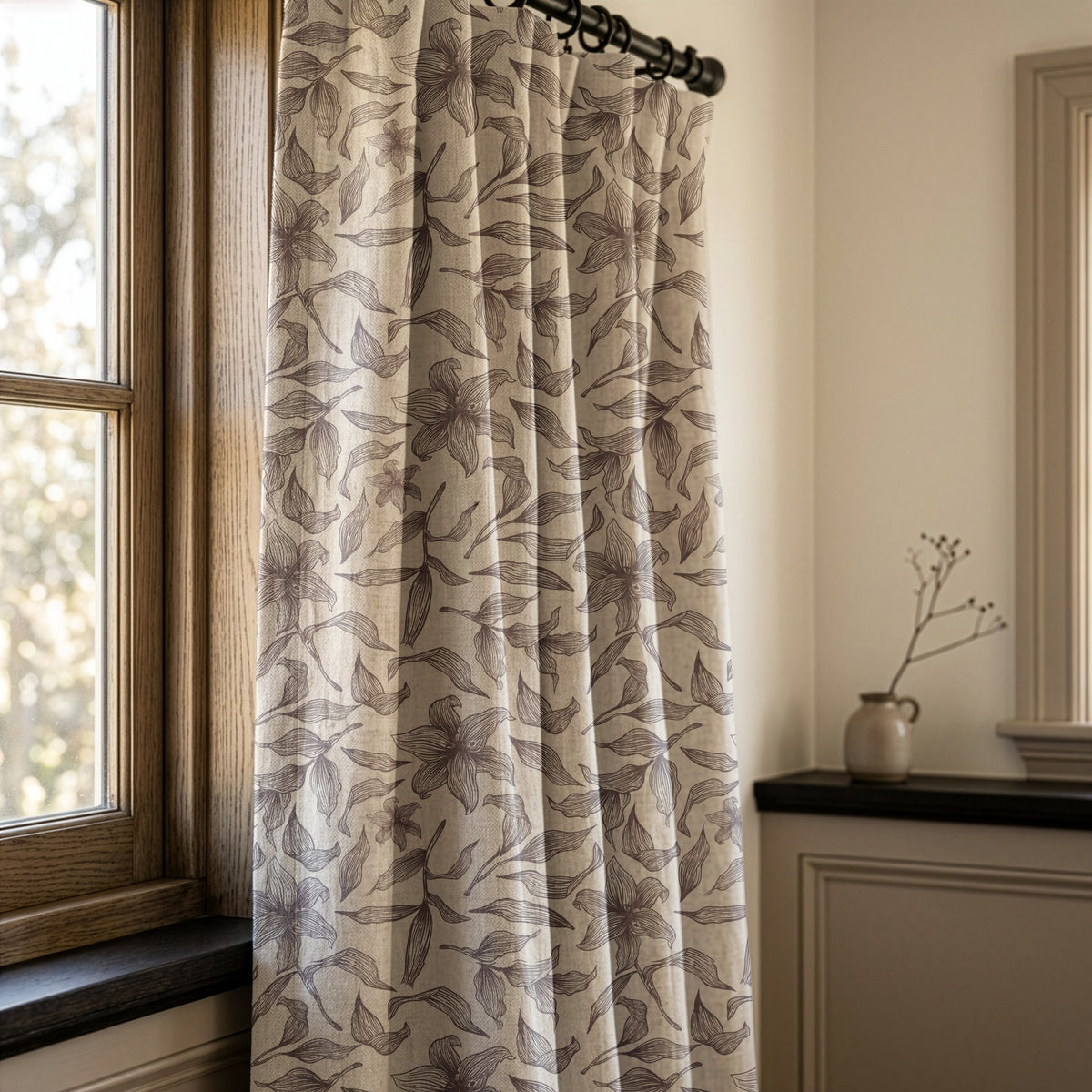 Grey line art lily curtains in a warm living room