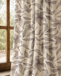 Pair of grey line art lily curtains at an arched window