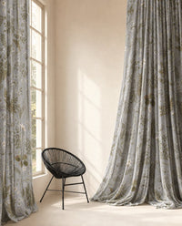 Pair of grey sage botanical floral curtains in a living room