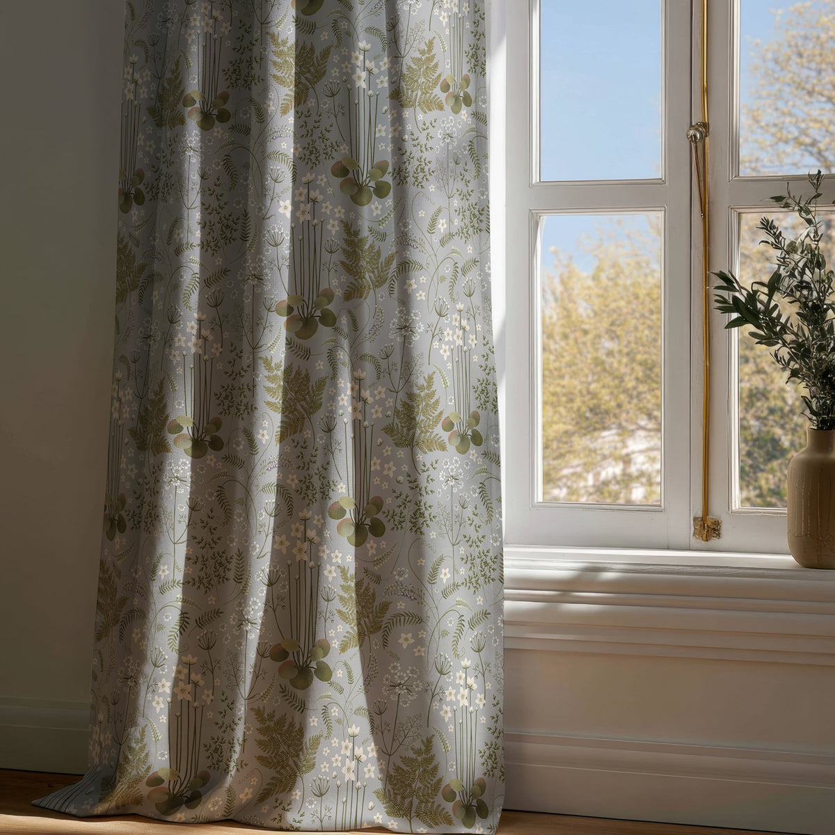 Full-length grey sage botanical floral curtain draping to a wooden floor