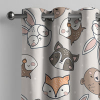 Grey woodland animal kids curtain on a grommet rod, close-up of the print