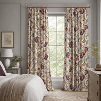Jacobean floral curtains in a bedroom