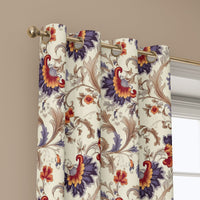 Grommet top of a jacobean floral curtain on a brass rod