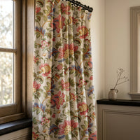 Jacobean floral curtains in a warm living room