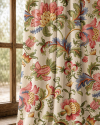 Pair of jacobean floral curtains at an arched window