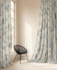 Pair of light blue meadow flower curtains in a bedroom