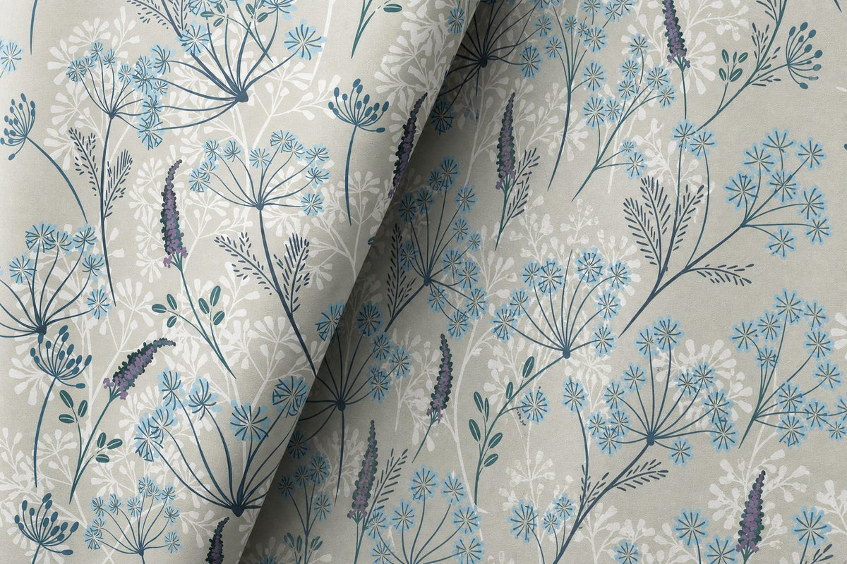Light blue meadow flower curtains styled with neutral decor